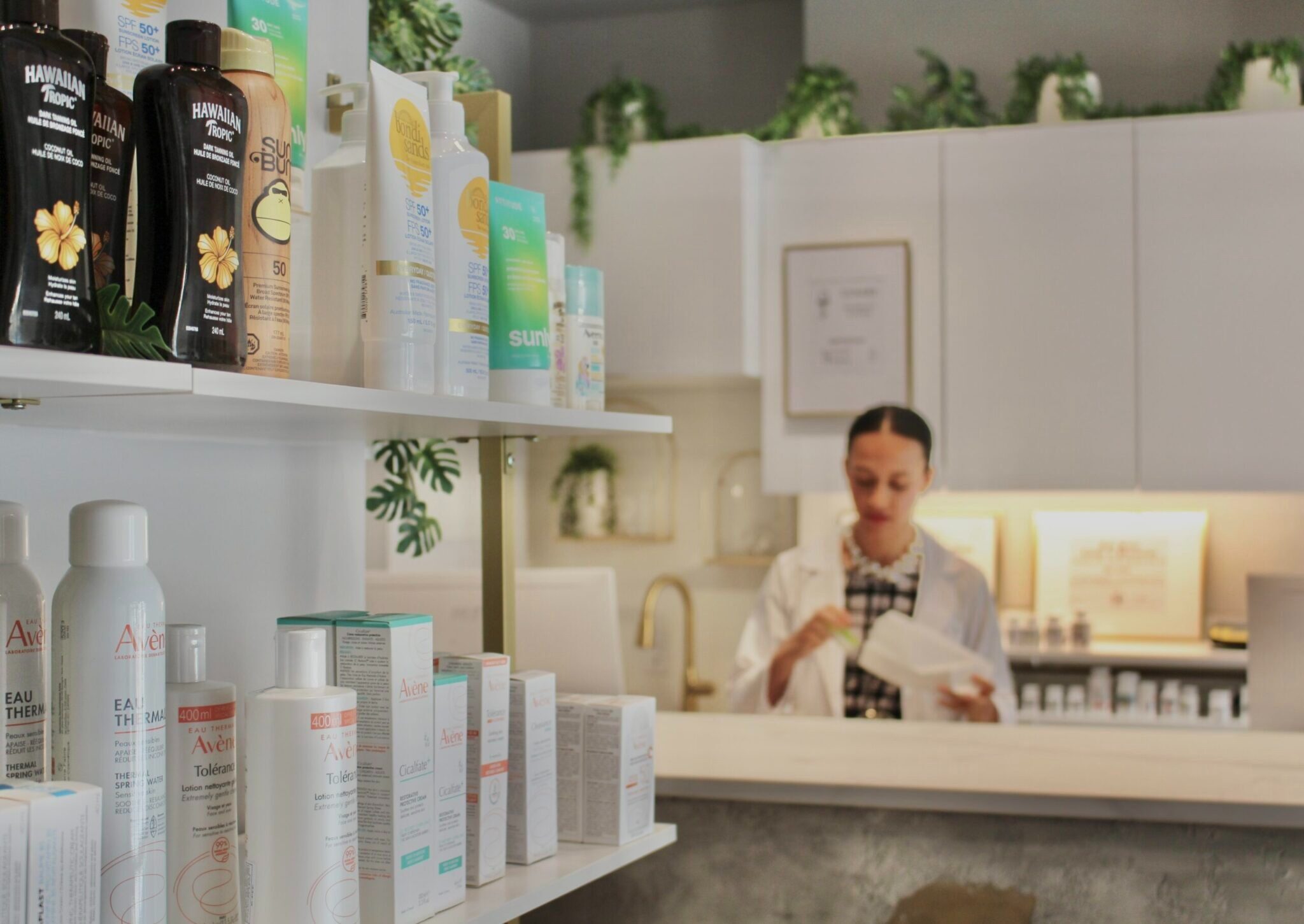 A Cunard Pharmacy pharmacist preparing a prescription